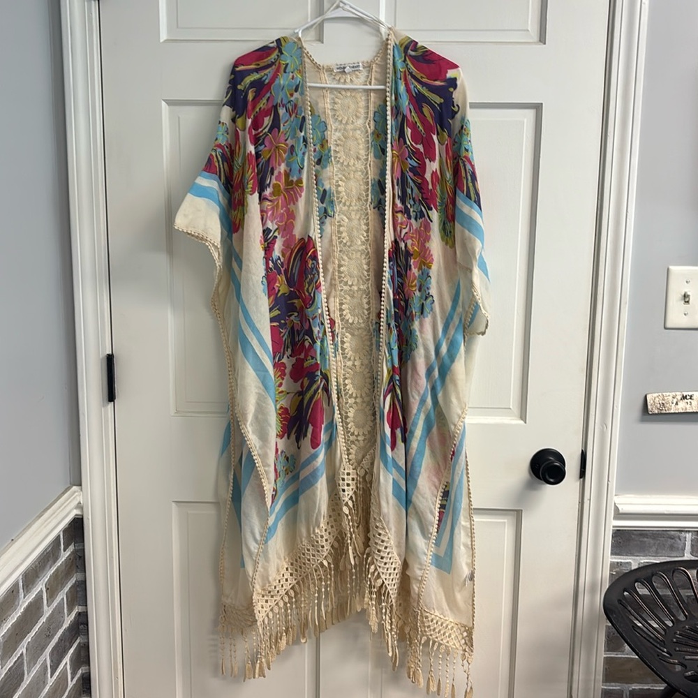 Bright colored kimono with lace detail on back